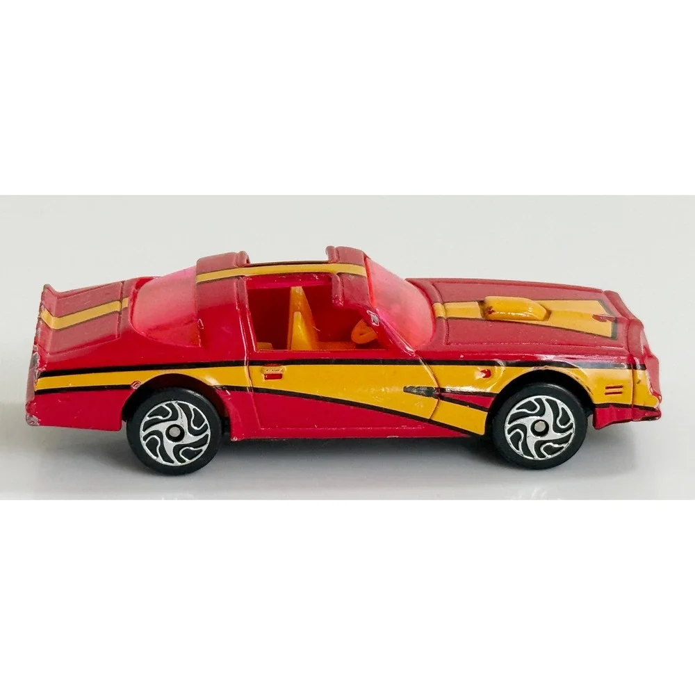 Racing Champions 1979 Pontiac Firebird Trans Am Kids 1/64 Red Yellow Stripes